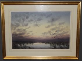 William H North ( 20th / 21st Century) Canada geese flying low over a water meadow. Watercolour,