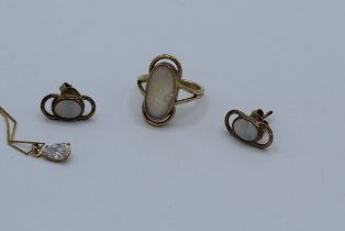 A collection of 9ct gold jewellery comprising a pair of opal set looped ear studs, a matching