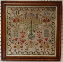 A large Victorian woolwork sampler. Woven with Adam and Eve beneath apple tree in Eden, surrounded