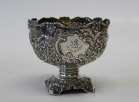 A Glasgow silver embossed footed bowl with gilded interior and with heraldic marks relating to the
