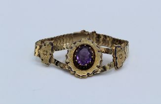 An amethyst set late 19th century American enamelled bracelet. Testing as 14ct gold. Gross weight