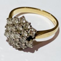 An 18ct yellow gold diamond cluster ring. At fault with one missing diamond. Size O. Gross weight