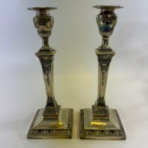 A pair of good quality weighted candlesticks.  Sheffield Hawksworth Eyre Ltd.  (Date letter rubbed).