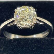 An 18ct white gold Old European diamond solitaire ring. The diamond measuring approximately 7.2mm in