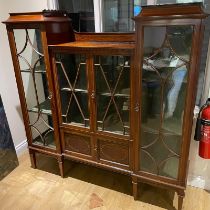 An Edwardian inlaid mahogany display cabinet with four astragal glazed doors and two cupboard