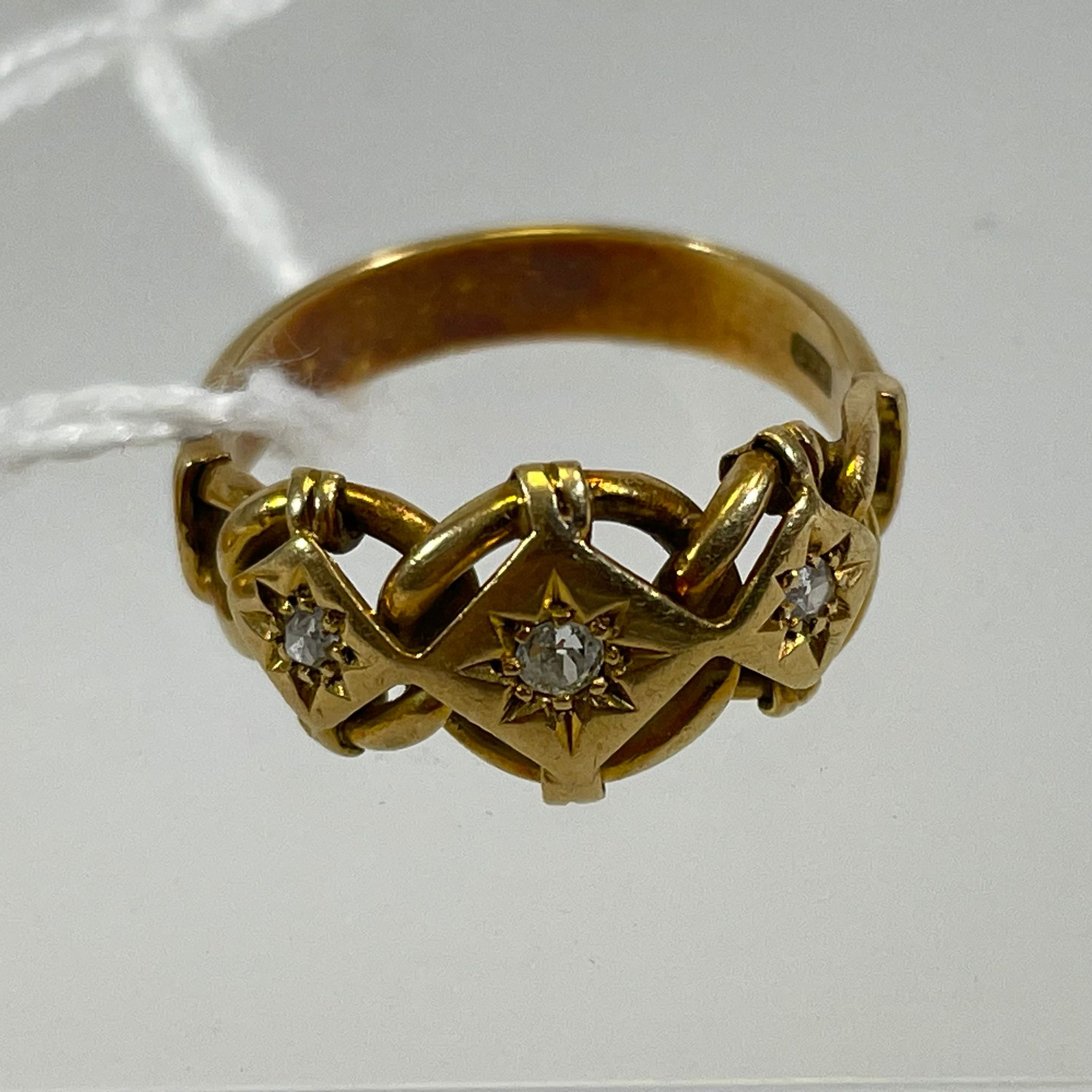 An 18ct yellow gold three stone diamond ring. Size O. Approximately 4.5 grams. Reasonably good, - Image 3 of 3