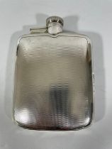 A silver hip flask. Sheffield 1946/47. James Dixon and Son retailed by Dunhill London. 5/16 pt