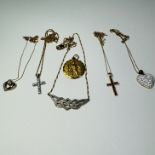 A collection of 9ct gold pendants and necklaces.  To include a diamond studded 9ct gold Celtic