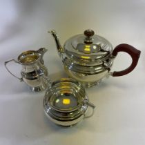 A silver three piece tea-set, Birmingham 1936/37 and 1938/39.  William Greenwood & Sour.  Total