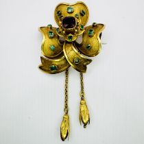 A Victorian gem set precious yellow metal Shamrock brooch, with two snowdrop shaped bell drops.  Set