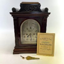 An early 20th Century mahogany bracket/table clock with triple fusee chiming movement, striking on
