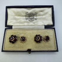 A pair of Vintage Italian made chain link flower head cufflinks, featuring garnets set into "750"