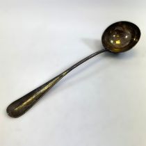 A silver rats tail ladle.  London 1891/92.  35 cm long and approximately 304 grams.  Engraving to