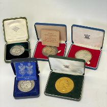A collection of Sterling silver and gilt metal medallions including 1972 Royal Anniversary Medal,