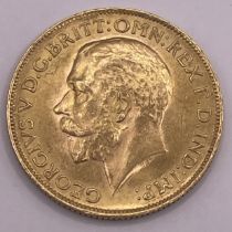 A George V Gold Full Sovereign dated 1925 Pretoria Mint.