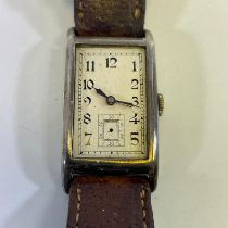 A gentleman's silver Omega manual wind wristwatch. Case number 7665330. Running but missing glass