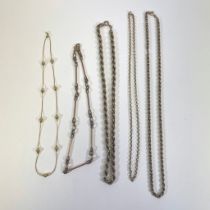 A collection of five 9ct gold necklaces. To include a 9ct small rope chain, approximate weight 7.4