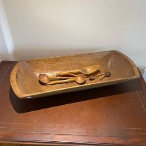 Large carved wooden trough, approximately 111cm wide together with 6 carved wooden spoons. Old