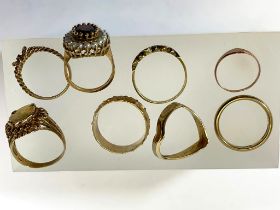 Eight 9ct Yellow Gold rings ranging in size from G to Q. Total weight approximately 23.7 grams.