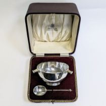 An A George V Irish hallmarked sterling silver three handled quaich. Marked for Edward & Sons,