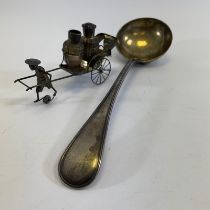 A silver ladle, Walker Hall Sheffield 1889/1890. Approximately 31 cm long and 288 grams. No