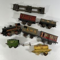 Hornby 'O' gauge loco, five trucks and a fender and 3 pieces of track - loco needs attention