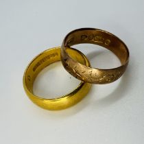 Two gold rings: A 22ct yellow gold plain band, size O, approximate weight 6 grams; a 9ct rose gold