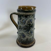 A Victorian Doulton Lambeth lemonade/ale jug. Numbered D596 1879 with scrolling foliate
