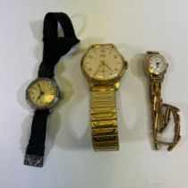 A 9ct yellow gold ladies manual wind wristwatch on a sprung 9ct strap.  Approximately 13.4 grams.