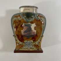 A Victorian Doulton Lambeth Acanthus decorated tea caddy and silver top and shield. Chester 1895/