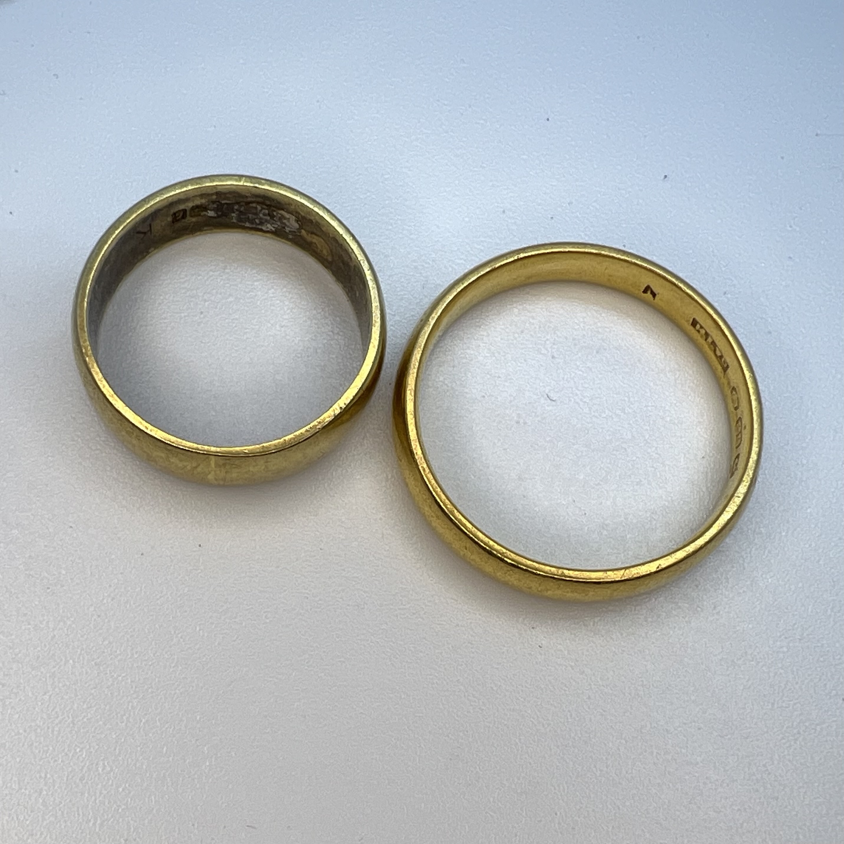 Two yellow gold band rings. Comprising a 22ct yellow gold band ring, size R, approximate weight 5. - Image 2 of 2