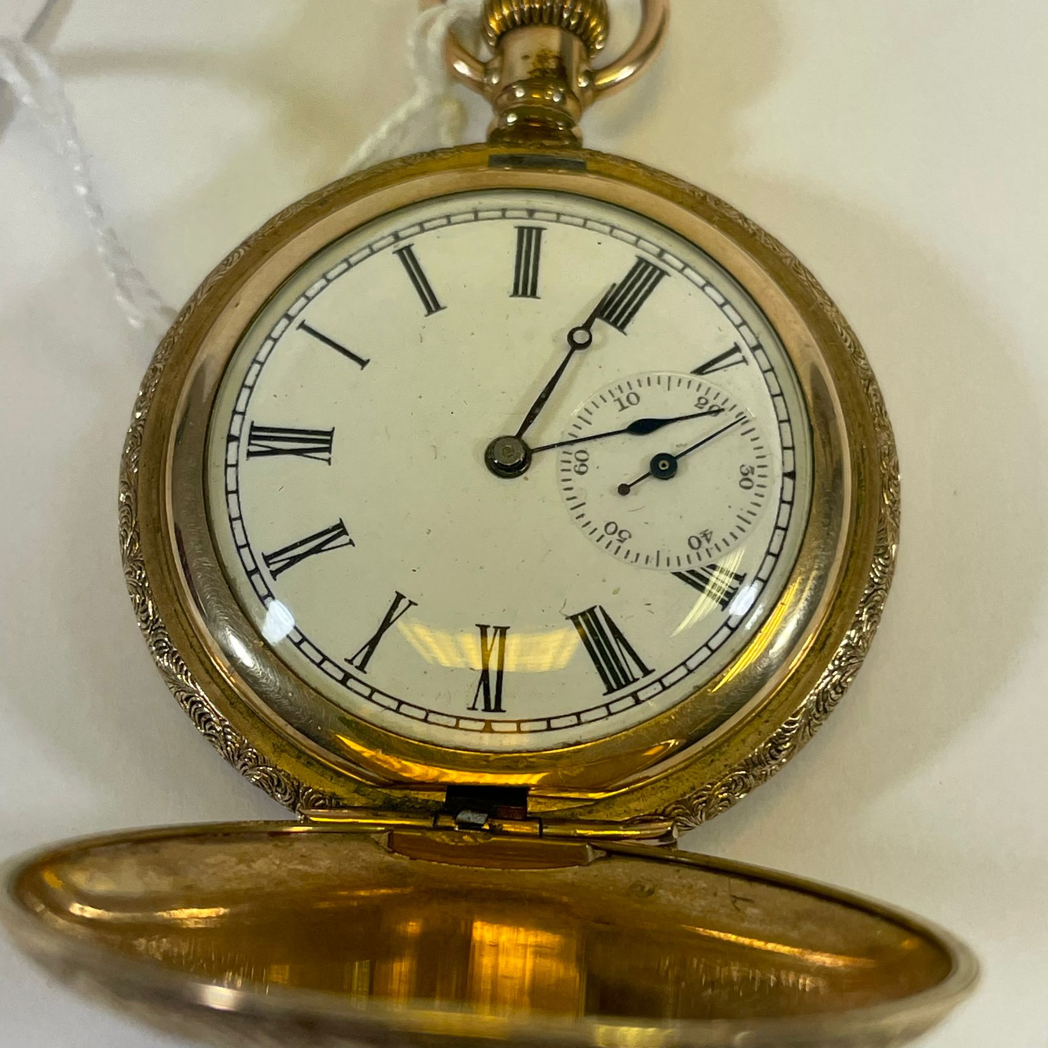 A "14K stamped American made engraved pocket watch  With a white enamel with Roman numerals and - Image 2 of 2