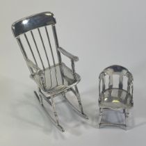 A George V sterling silver miniature chair marked for Barker Brothers Silver Ltd, Birmingham,