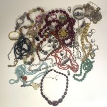 A large collection of costume jewellery including necklaces, bracelets, pendants brooches, dress