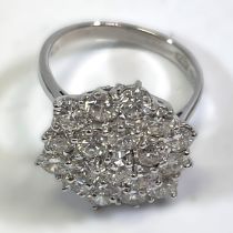 A handmade 18ct white gold diamond cluster ring, featuring a cluster of 19 0.15 carat (estimated)