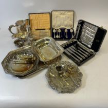 A collection of silver plate to include a Mappin and Webb cruet set, and a variety of Sheffield