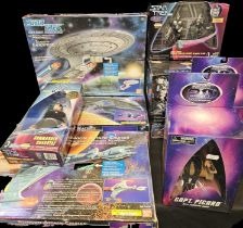 Collection of 8 boxed Star Trek Figures. Some boxes opened with wear to contents