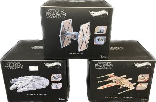 3 Star Wars boxed Hot Wheels figures including: - - Millennium Falcon - Wing Fighter - Tie Fighter