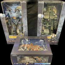 Collection of three large Pacific Rim figures including:- - Jaeger Gipsy Danger 18" - Churno Alpha