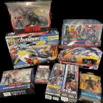 Collection of 8 Hasbro El Disney Store Marvel figures, including:- - Avengers Quinjet - Civil War