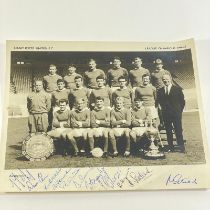 Signed Manchester United photo of the League champions team from 1964-65 season.