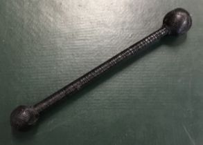 A late 19th / early 20th century double ended cosh. Of unusual form, with a weighted ball terminal