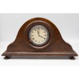 A mid 20th century Jaeger of Paris mantle clock, in oak with four feet and 8 Jours to dial.