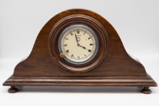 A mid 20th century Jaeger of Paris mantle clock, in oak with four feet and 8 Jours to dial.