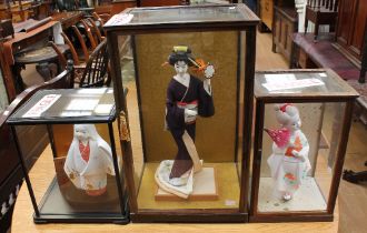 Three traditional Japanese folk craft dolls to include: one large Geisha kimono drum doll, approx