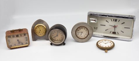 A 1930s Art Deco hallmarked silver clock, a similar pewter clock and three other clocks