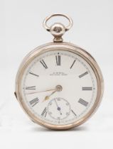 A Victorian silver cased open faced Waltham pocket watch, comprisng a white enamel dial with numeral