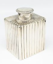 A Victorian silver rectangular tea caddy, with ribbed designed body and removable silver cap,