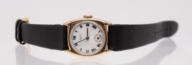 An early 20th century 9ct gold W.C Watts of Derby wristwatch, comprising a signed white enamel dial,