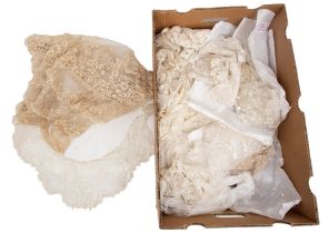 A collection of lace to include collars and scarves that were used to hold Edwardian hats on in